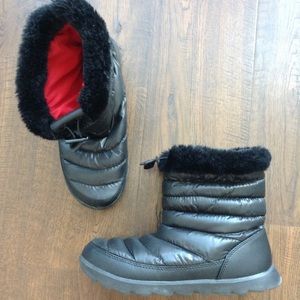 Women's Northface Puffer Boots.